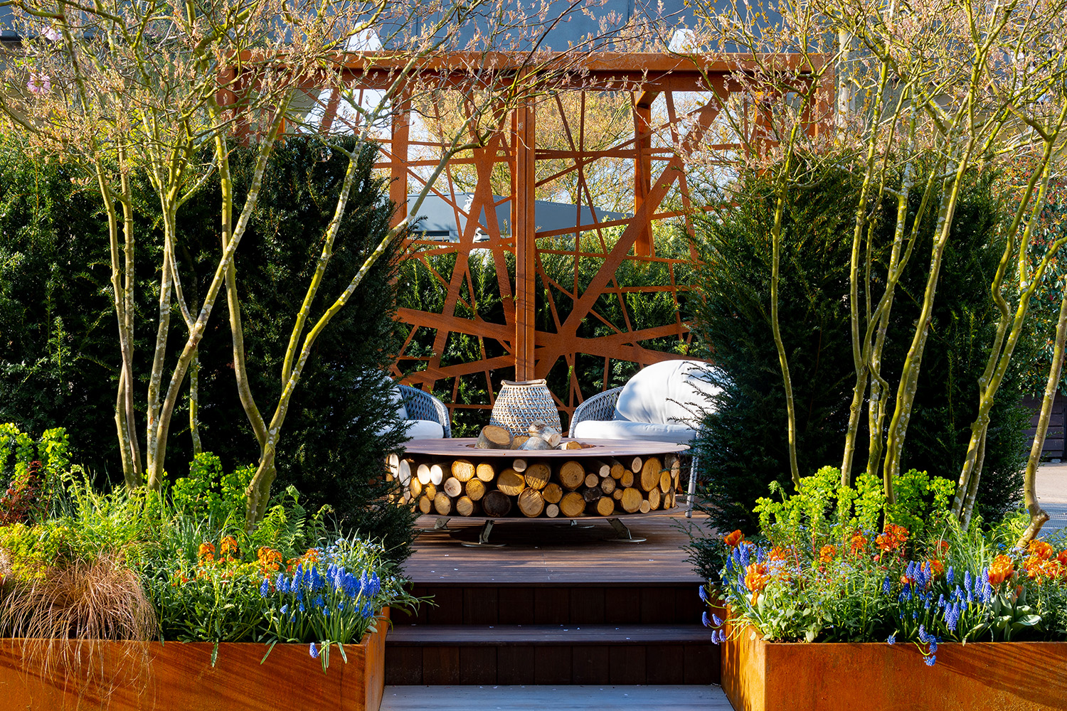 A small city garden divided into rooms